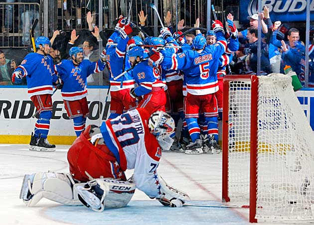 Capitals goalie Braden Holtby (70) reacts after the Rangers scored in OT to end their second-round series.